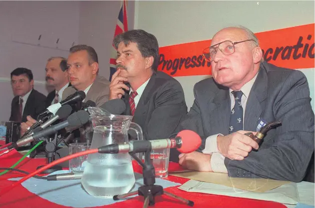  ?? PACEMAKER ?? Truce: Former UVF leader Gusty Spence (right), along with (from left) David Adams, David Ervine, Gary Mcmichael and William Smith, announces the loyalist ceasefire in 1994