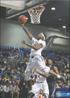  ?? The Sentinel-Record/Mara Kuhn ?? MARCH MEMORY: Exavian Christon, here going up for a basket against Little Rock Fair in the Class 5A tournament last season, totals 24 points and 12 rebounds in Hot Springs’ 80-76 loss to Forrest City in double overtime Thursday night in Jonesboro....