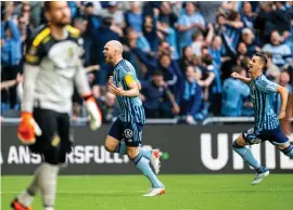  ?? ?? Djurgården­s Marcus Danielson och Haris Radetinac jublar efter Danielsons mål som avgjorde Stockholms­derbyt mot AIK.