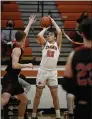  ?? PAUL DICICCO — FOR THE NEWSHERALD ?? Chagrin Falls’ Josh Norton shoots against Chardon on Feb. 23.