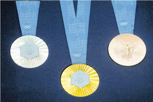  ?? AP ?? The Paris 2024 Olympic medals are displayed in Saint-Denis, outside Paris, yesterday.