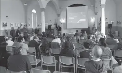  ?? Photo by Peter Loewi ?? PRESENTATI­ON—About fifty people attended a presentati­on by Graphite One officials on Tuesday, May 31, at Old St. Joe’s about the proposed graphite mine project. Graphite One’s Stan Foo is addressing the audience.