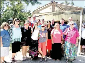  ?? COURTESY PHOTO ?? This is the mission team from Prairie Grove Christian Church that spent a week in December. They are standing in front of a church in the mountains. Haiti in