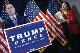  ?? Brendan Smialowski / AFP via Getty Images ?? RNC Chair Ronna McDaniel listens while the Trump campaign’s general counsel, Matthew Morgan, addresses a news conference earlier this month.