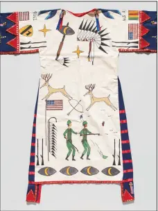  ?? (Photo by R. A. Whiteside, National Museum of the American Indian) ?? “A Warrior’s Story, Honoring Grandpa Blue Bird,” a contempora­ry painted dress by artist Lauren Good Day GIago at the National Museum of the American Indian, honors Native veterans who gave their lives to defend the U.S.