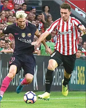  ?? EPA/JAVIER LIZON ?? SULIT: Bintang Real Gareth Bale berduel dengan gelandang Sevilla Vicente Iborra pada 20 Maret lalu. Foto kanan, striker Barca Lionel Messi dikawal bek Athletic Aymeric Laporte di San Mames (28/8).