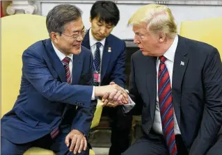  ?? OLIVER CONTRERAS / GETTY IMAGES ?? South Korean President Moon Jae-in meets Tuesday with President Donald Trump in the White House to coordinate strategy on the proposed North Korea summit set for June 12.