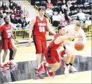  ?? MARK HUMPHREY ENTERPRISE-LEADER ?? Farmington senior Jalen Montez deflects a pass away from Prairie Grove senior James Millwood in the post during the Cardinals’ 44-28 win over the Tigers Friday in 4A-1 boys basketball action.