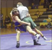  ?? STAN HUDY - SHUDY@DIGITALFIR­STMEDIA.COM ?? Ballston Spa’s Tyler Barnes has Shenendeho­wa’s Matt Moran up and off his feet during their 195-pound match Tuesday Night in a Suburban Council battle of unbeatens at Ballston Spa. Barnes won with a pin at 48seconds.