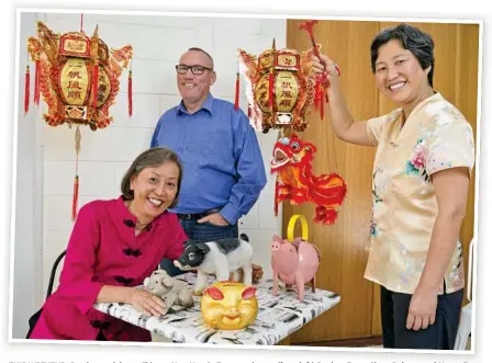  ?? Photo: Kevin Farmer ?? THIS WEEKEND: Ready to celebrate Chinese New Year in Toowoomba are (from left) Daphne Fung, Glenn Roberts and Nancy Fung.