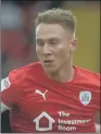  ??  ?? CAULEY WOODROW:
Barnsley strker netted twice against league leaders West Brom.