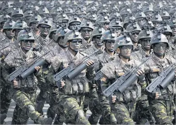  ?? Wong Maye-E Associated Press ?? NORTH KOREAN commandos march in a Pyongyang military parade. The country has 1.2 million soldiers.