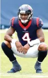  ?? Mark Zaleski/Associated Press ?? ■ Houston Texans quarterbac­k Deshaun Watson pauses on the field after time ran out in the fourth quarter and the Texans' final drive ended in an NFL football game against the Tennessee Titans on Sunday in Nashville, Tenn.