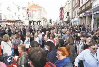  ?? Chris Jackson / Getty Images ?? Thousands of well- wishers are descending upon Windsor, England, amid final preparatio­ns for the royal wedding between Prince Harry and American Meghan Markle.