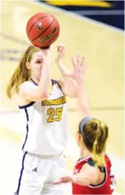  ??  ?? UTC’s Abbey Cornelius shoots against Samford on Saturday. Cornelius led the Mocs with 16 points.