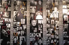  ??  ?? This picture shows pictures of so-called comfort women on a wall in a museum in Shanghai.