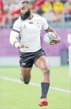  ?? Picture: JOVESA NAISUA ?? Semi Radradra on attack against Wales during their pool match at the Oita Stadium in Oita, Japan, on Thursday.