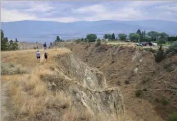  ?? J.P. SQUIRE/Special to The Daily Courier ?? This week’s Secret Okanagan Spot is Wally Bonin Park, located on Penticton’s West Bench and on the east side of the KVR Trail between Penticton and Summerland. Its trails head east along the edge of a wide, deep gully to panoramic views of Okanagan Lake, above.