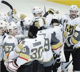  ?? MARCIO JOSE SANCHEZ THE ASSOCIATED PRESS ?? Vegas Golden Knights players hug after a 3-0 win over the San Jose Sharks in Game 6 on Sunday night.