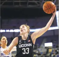  ?? Jeff Roberson / Associated Press ?? UConn’s Katie Lou Samuelson (33) reaches for a rebound while defended by Saint Louis’ Jordyn Frantz on Dec. 4 in St. Louis. Samuelson has made a concerted effort to increase her rebouding numbers this season.