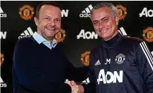  ??  ?? Happier times: Mourinho and United chief Ed Woodward agreed a new deal last year GETTY IMAGES