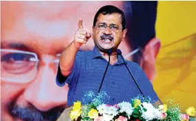  ?? (Photo by Biju BORO / AFP) ?? (FILES) Delhi's chief minister Arvind Kejriwal speaks during a public rally in Guwahati on April 2, 2023. Indian authoritie­s arrested prominent opposition politician and Delhi chief minister Arvind Kejriwal on March 21, 2024, a minister in his government said.