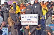  ?? (AFP) ?? File photograph of Muslim women taking part in a silent protest rally to demand a repeal of the ‘triple talaq’ bill in Kolkata in India