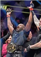  ?? DAVID BECKER/AP ?? Jon Jones celebrates after defeating Ciryl Gane in a heavyweigh­t title bout at UFC 285 on Saturday in Las Vegas.