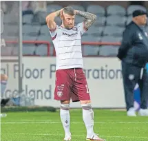  ?? ?? Arbroath’s Bobby Linn looks dejected at Dens.