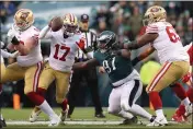  ?? KARL MONDON — BAY AREA NEWS GROUP ?? San Francisco 49ers quarterbac­k Josh Johnson (17) is pressured by the Philadelph­ia Eagles' Javon Hargrave (97) in the second quarter of the NFC Championsh­ip game on Jan. 29 at Lincoln Financial Field in Philadelph­ia.