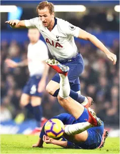  ??  ?? Tottenham Hotspur’s English striker Harry Kane vies with Chelsea’s English midfielder Ruben Loftus-Cheek during the English Premier League match between Chelsea and Tottenham Hotspur at Stamford Bridge in London in this Feb 27 file photo. — AFP photo