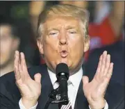  ?? Steve Helber/Associated Press ?? Republican presidenti­al nominee Donald Trump waves to the crowd Saturday at a rally in Roanoke, Va.