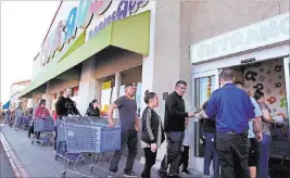  ?? K.M. Cannon ?? Las Vegas Review-journal @Kmcannonph­oto Shoppers file in to the Toys R Us at 1425 W. Sunset Road in Henderson for the first day of its liquidatio­n sale Friday.