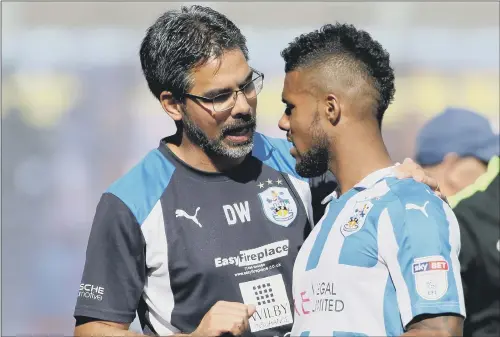  ?? PICTURE: RICHARD SELLERS/PA WIRE ?? ON FAMILIAR TERITORY: Huddersfie­ld Town’s head coach David Wagner became used to a two-window transfer system while in his native Germany.