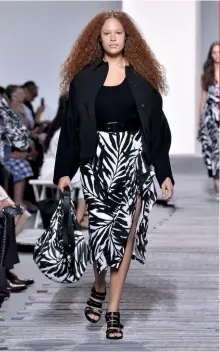  ??  ?? Left: a plus-size model walks for Michael Kors S/S ’18 at NYFW. Below: Roland Mouret designs for size 6 to 20