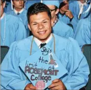  ?? JESI YOST — FOR DIGITAL FIRST MEDIA ?? Daniel Boone senior Luis Barrales Jr. shows his graduation cap, decorated with Rosemont College, where Barrales will be attending in the fall.