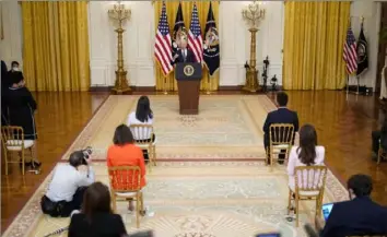  ?? Doug Mills/The New York Times ?? President Joe Biden speaks Thursday during a news conference to discuss the benefits of his economic recovery efforts, tout progress in vaccinatio­ns and respond to criticism about his handling of the migrant surge at the U.S. border with Mexico, in the East Room of the White House in Washington.