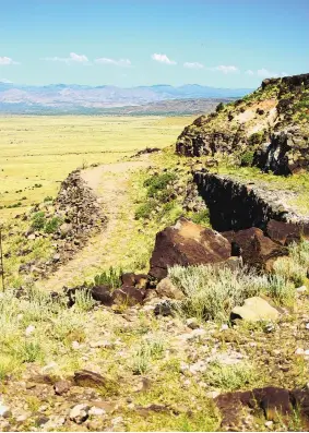  ?? GLEN ROSALES/FOR THE JOURNAL ?? Hairpin switchback­s marked the old climb up La Bajada to the Caja del Rio. The land has long been sacred to puebloan peoples.