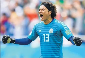  ?? HECTOR VIVAS/GETTY ?? In two matches, Mexico goalkeeper Guillermo Ochoa has allowed just one goal and has made a World Cup-high 14 saves.