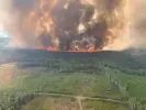  ?? Photograph: Alberta Wildfire/Reuters ?? Smoke rises from the Bald Mountain Fire in the Grande Prairie forest area near Alberta, Canada.