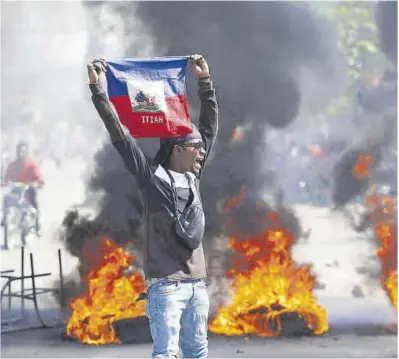  ?? Odelyn Joseph / AP ?? Protesta contra el primer ministro Ariel Henry en Puerto Príncipe, el pasado 1 de marzo.