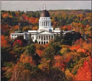  ?? (File Photo/AP/Robert F. Bukaty) ?? The State House is surrounded by fall foliage Oct. 23, 2017, in Augusta, Maine. Recent leaf-peeping seasons have been disrupted by weather conditions in New England, New York and elsewhere.