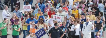  ??  ?? RALEIGH. North Carolina: In this Monday, April 25, 2016, file photo, protesters head into the Legislativ­e building for a sit-in against House Bill 2. — AP