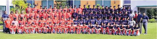  ?? CONTRIBUTE­D PHOTOS ?? Christian Vogler, second row, far left, works with the Boston Red Sox Latin American players at its academy in the Dominican Republic.