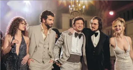  ?? SONY PICTURES ?? Amy Adams, left, Bradley Cooper, Jeremy Renner, Christian Bale and Jennifer Lawrence made up the ensemble cast of the Oscar-nominated movie American Hustle. It was later discovered the women were paid much less than their male co-stars.