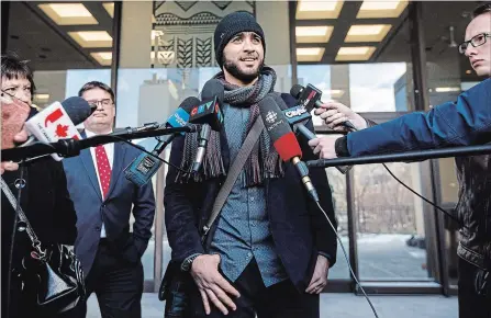  ?? JASON FRANSON THE CANADIAN PRESS ?? Omar Khadr speaks outside court in Edmonton on Dec. 13. Khadr is seeking a Canadian passport to travel to Saudi Arabia in order to perform the Hajj, a pilgrimage to Mecca and wants permission to speak to his sister, who has previously spoken in favour of al-Qaida, over the phone or on Skype.