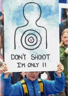  ??  ?? Young and aware:A young protester holding up a placard during the ‘March for Our Lives’ rally in support of gun control in San Francisco in this file photo.— AP