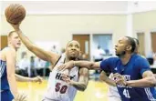  ?? AP FILE ?? Rodney McGruder participat­ed in three summer leagues with the Miami Heat before the team signed him to a three-year deal.