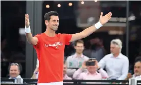  ??  ?? Novak Djokovic replaces Filip Krajinović against Jannik Sinner at the exhibition match in Adelaide. Photograph: Kelly Barnes/AAP