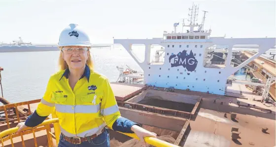  ??  ?? Elizabeth Gaines atop a shiploader at iron ore miner Fortescue’s Port Hedland facilities in the Pilbara region of Western Australia.